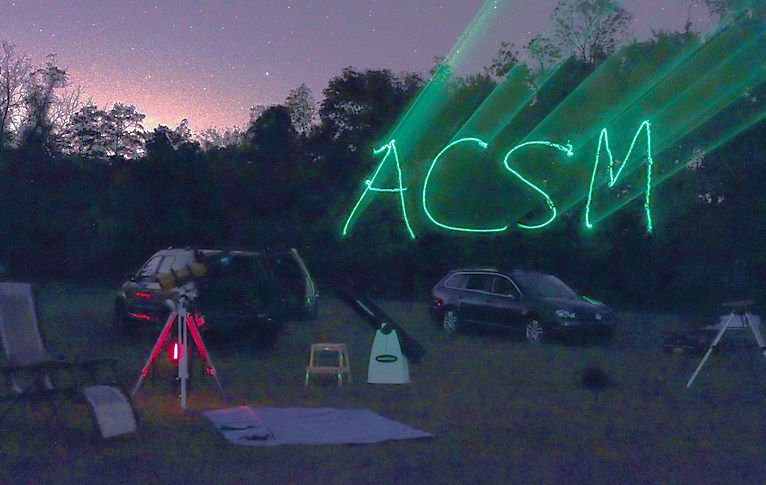 lasers spelling out ACSM